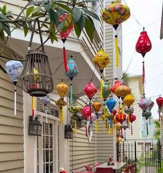Silk lanterns strung above Bareo's brick garden patio