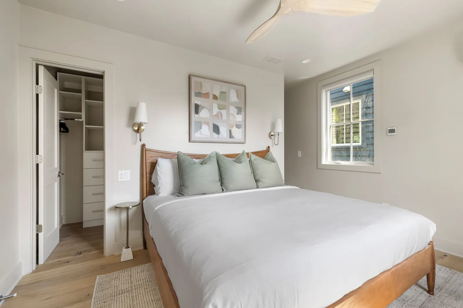A king bedroom, one of three king bedrooms in each home